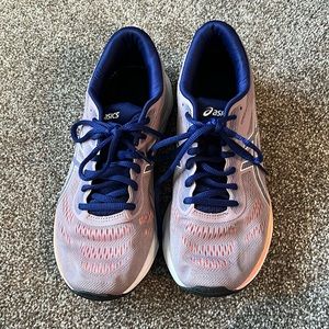 lightly worn asics running shoe